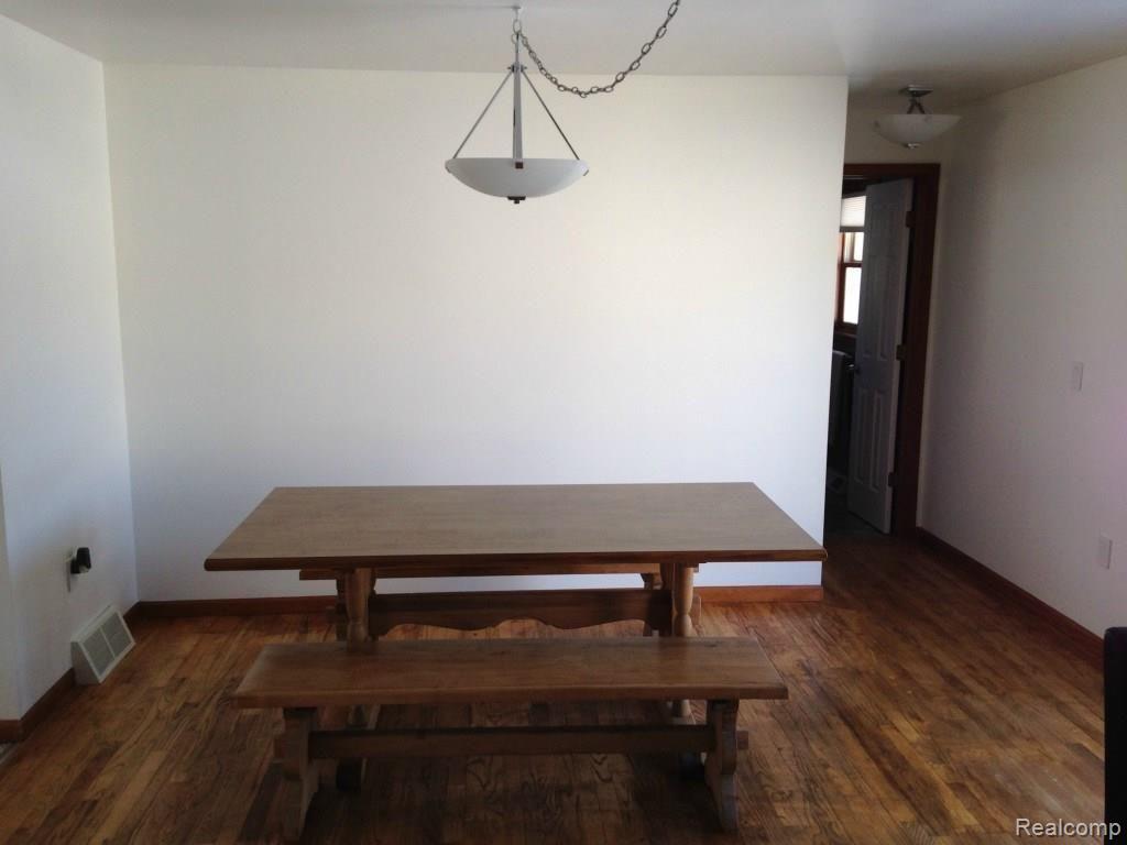 1375 West Marr Road Howell, MI 48855 - Photo 14 of 34 Dining room with solid oak floors