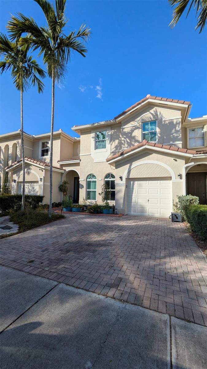 a view of a street with a house