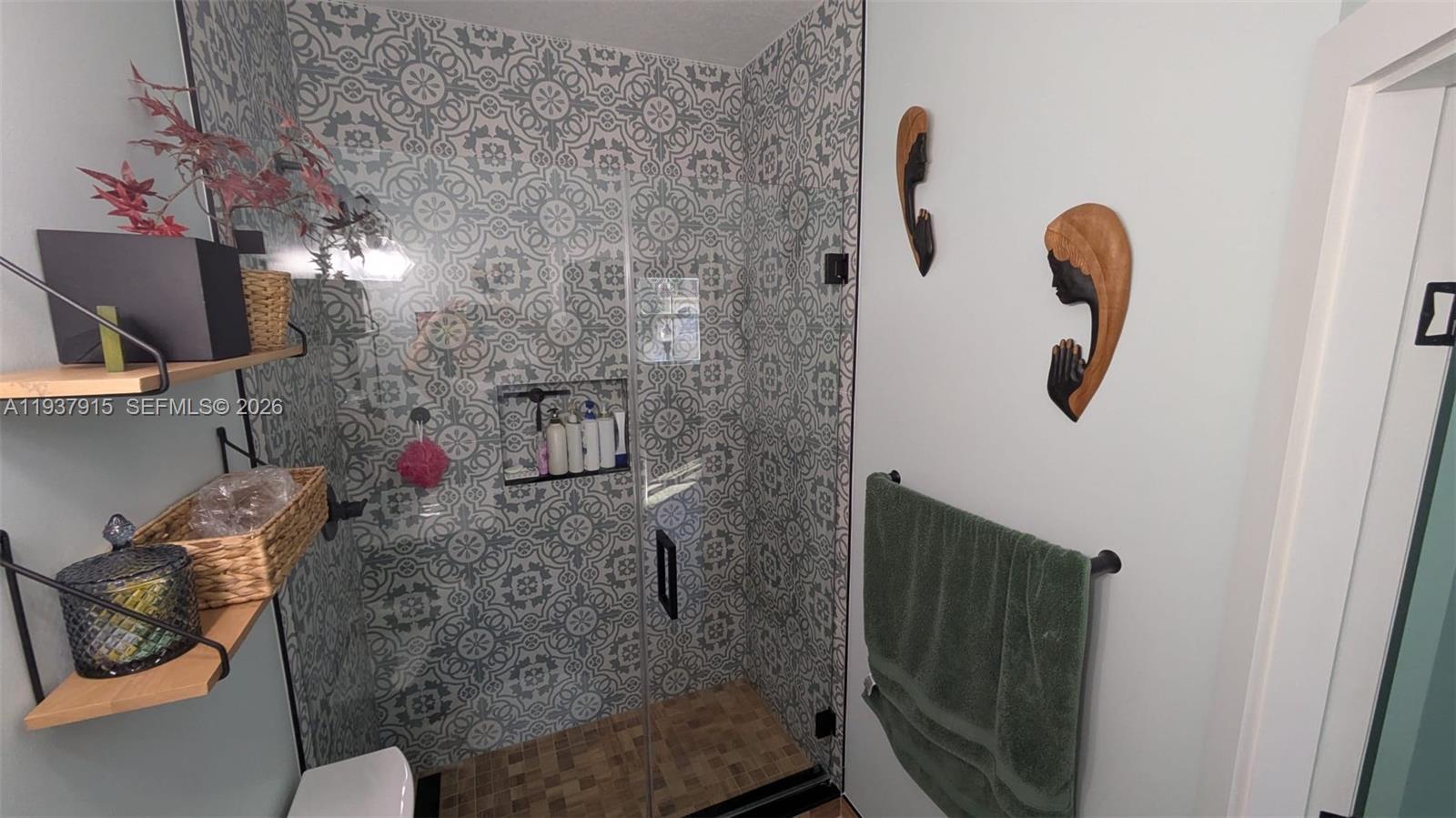 12293 Southwest 123rd Terrace Miami, FL 33186 - Photo 13 of 30 a bathroom with a shower