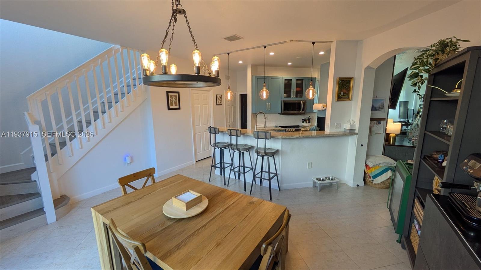 12293 Southwest 123rd Terrace Miami, FL 33186 - Photo 30 of 30 a view of kitchen dining table and chairs