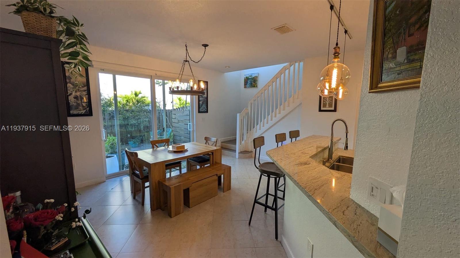 12293 Southwest 123rd Terrace Miami, FL 33186 - Photo 8 of 30 a room with furniture and window