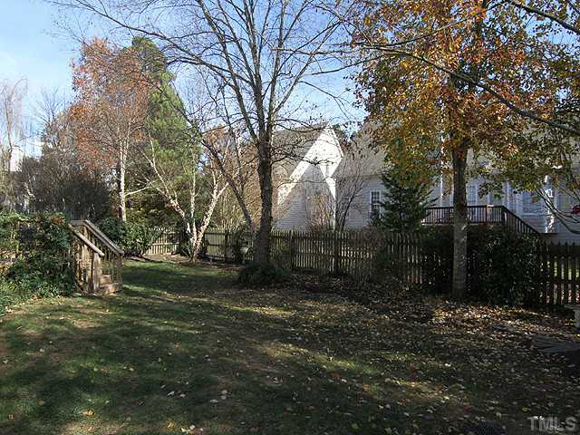 12308 Amoretto Way Raleigh, NC 27613 - Photo 12 of 13 Fenced backyard - Trees.