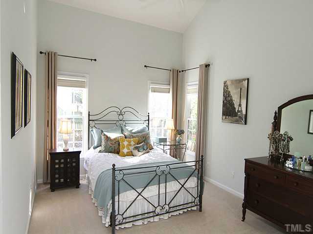12308 Amoretto Way Raleigh, NC 27613 - Photo 8 of 13 1st floor master suite with cathedral ceiling and lots of windows.