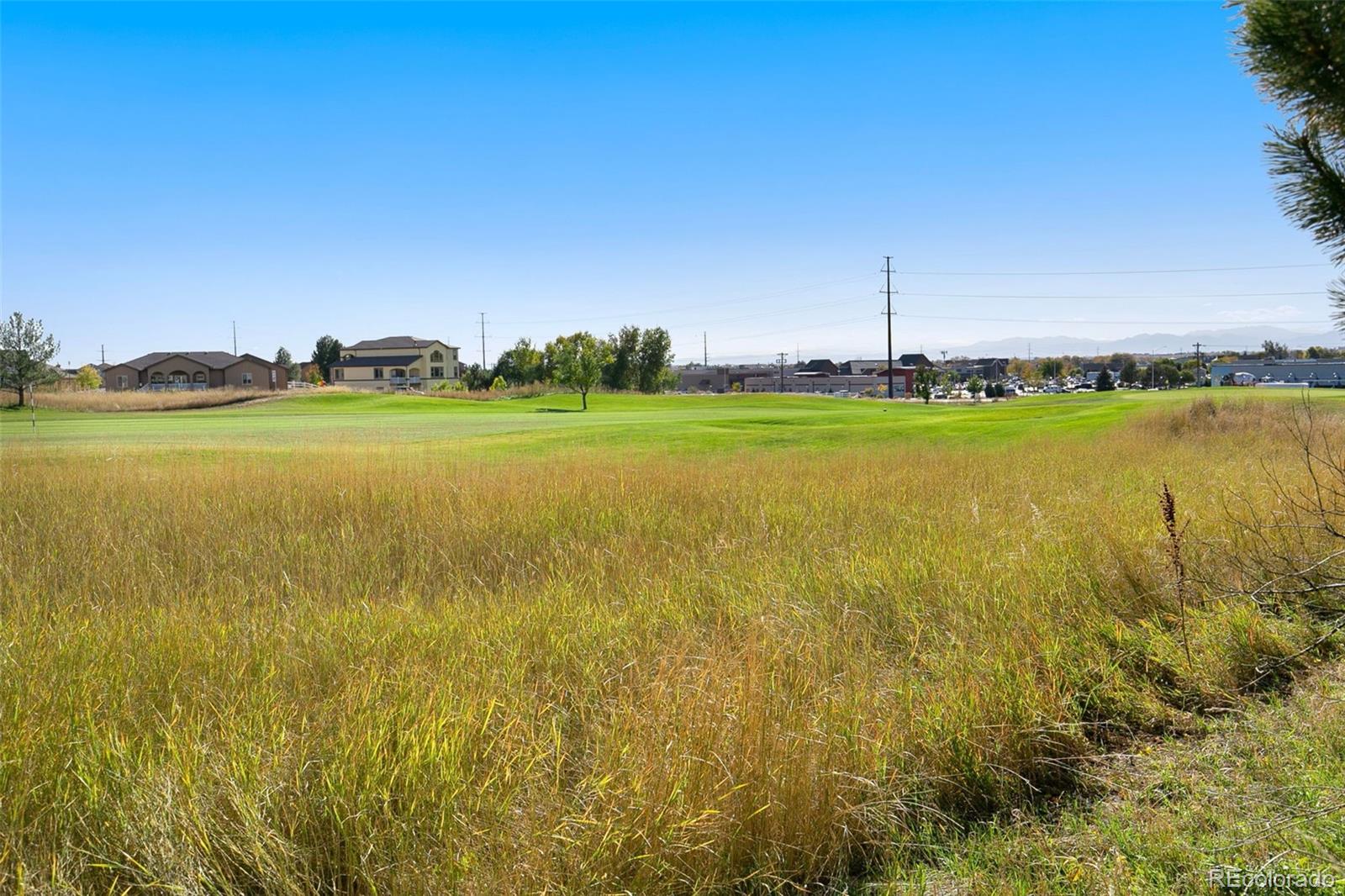 1606 Conestoga Drive Fort Lupton, CO 80621 - Photo 22 of 25 a view of an ocean and beach
