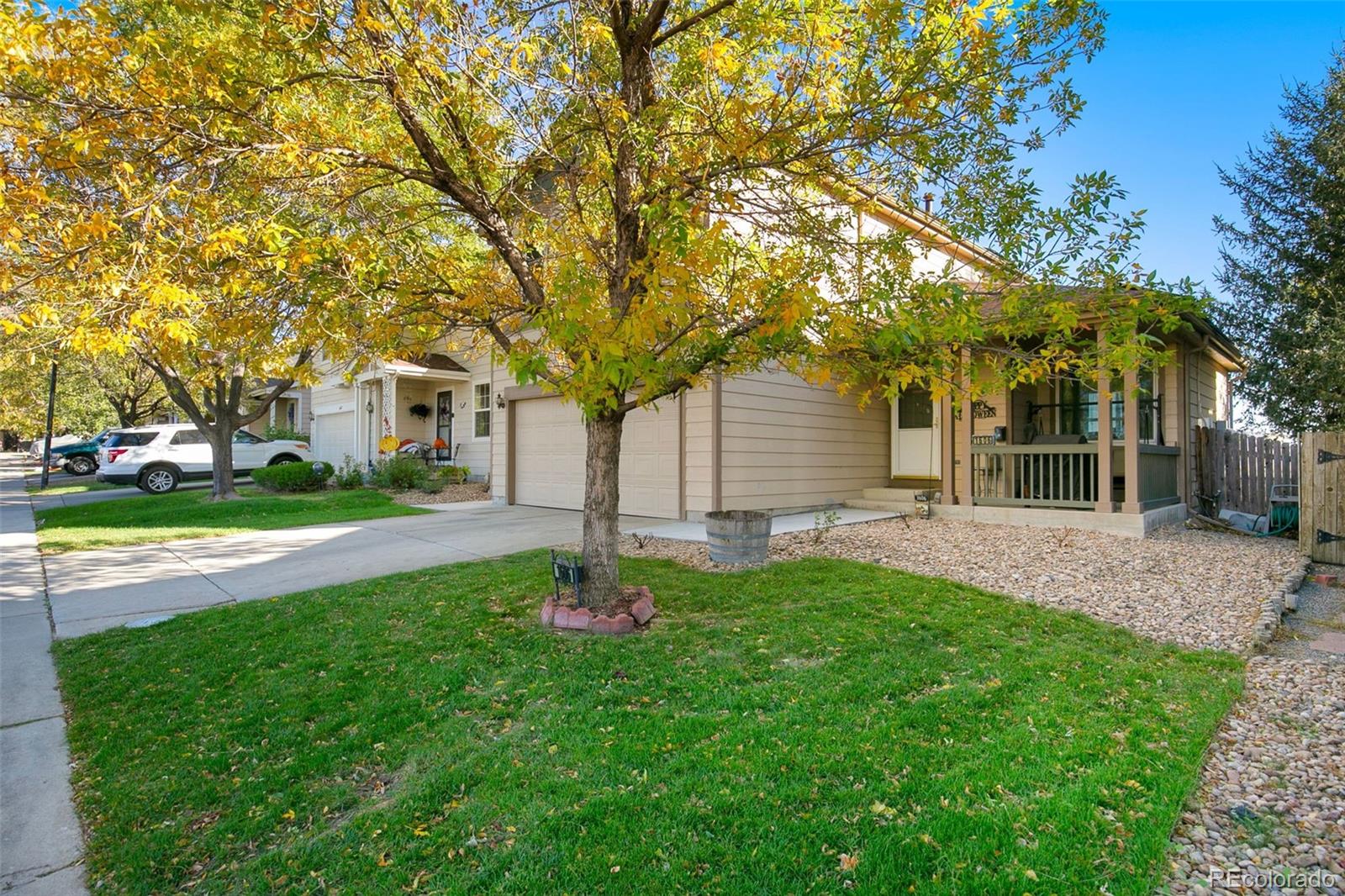 1606 Conestoga Drive Fort Lupton, CO 80621 - Photo 3 of 25 a house view with a garden space