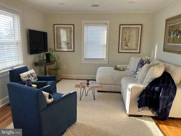 a bedroom with bed and window
