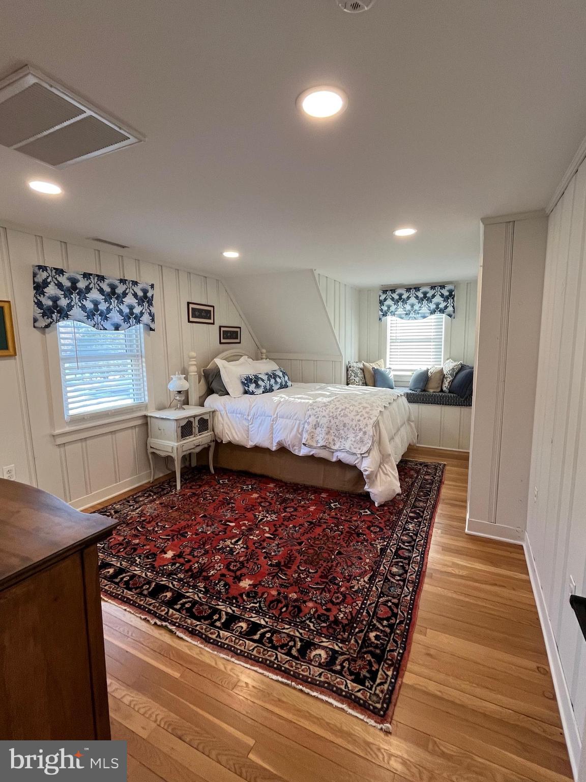 21560 Chicken Point Road Tilghman, MD 21671 - Photo 17 of 25 a living room with a couch and wooden floor