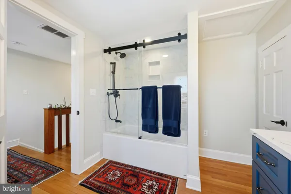a living room with furniture or couch and a flat screen tv