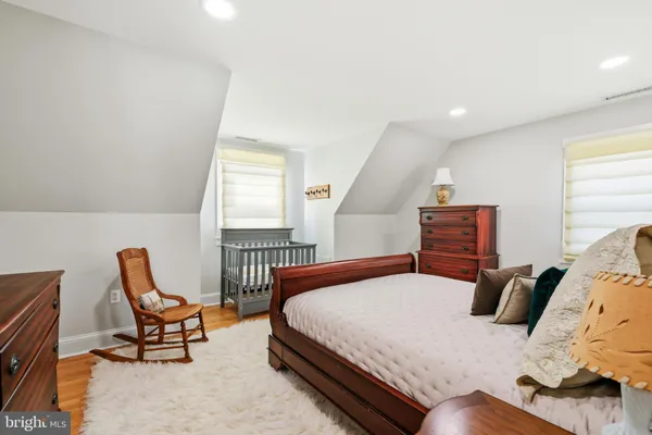 a bedroom with furniture and a couch