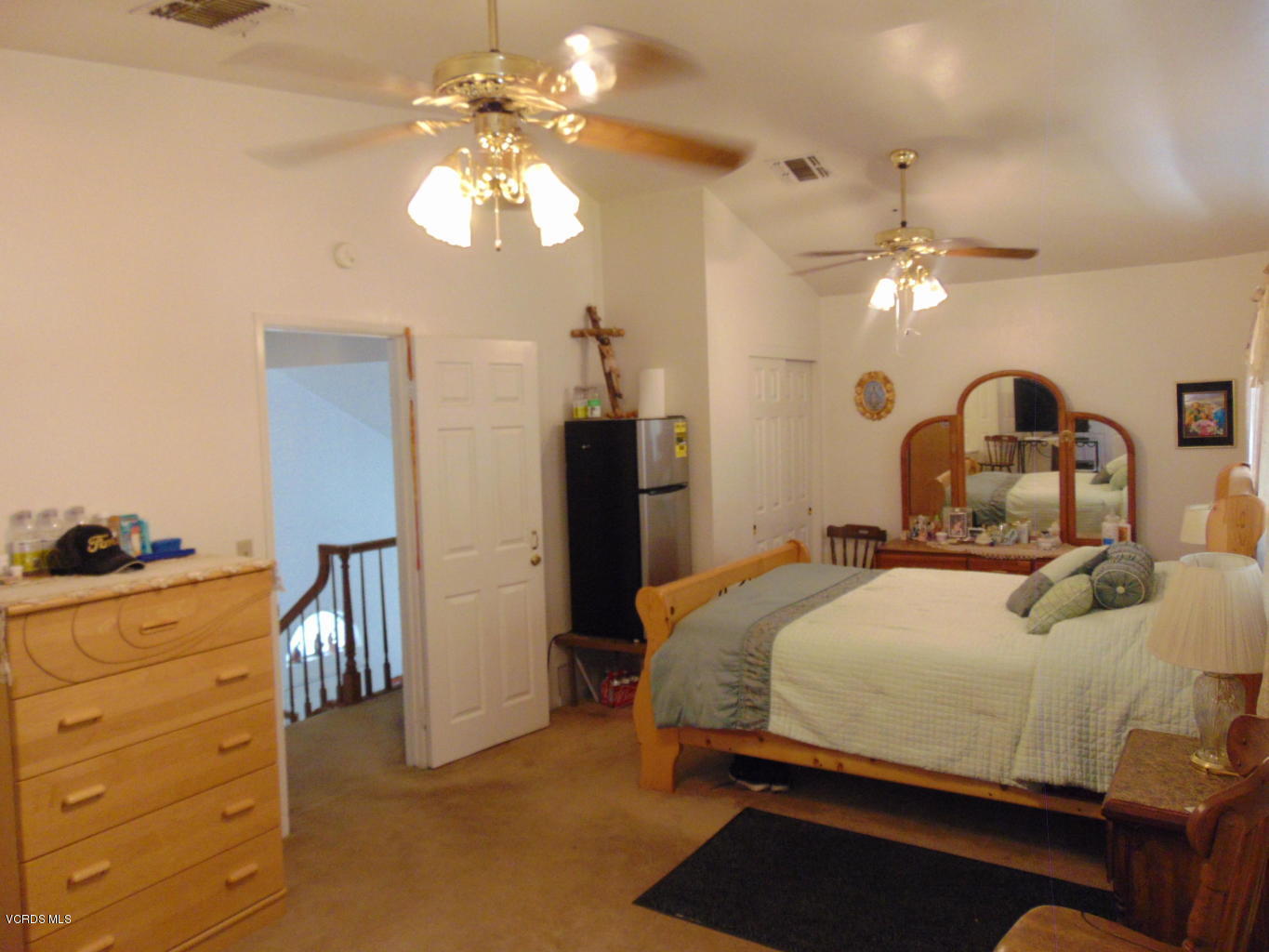 34440 Red Rover Mine Road Acton, CA 93510 - Photo 14 of 39 a bedroom with a bed and a chandelier