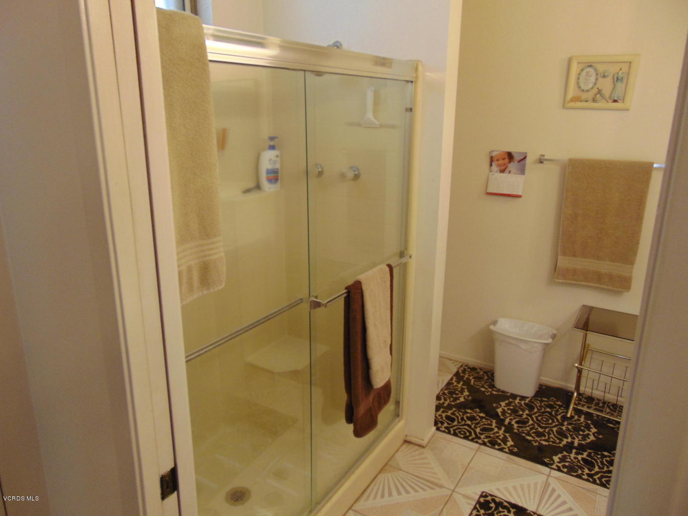 34440 Red Rover Mine Road Acton, CA 93510 - Photo 17 of 39 a bathroom with a sink and glass door shower
