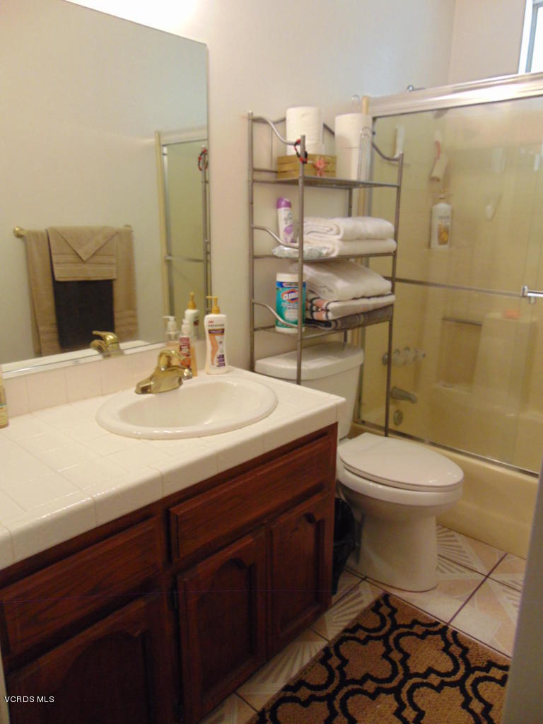34440 Red Rover Mine Road Acton, CA 93510 - Photo 22 of 39 a bathroom with a sink toilet and shower