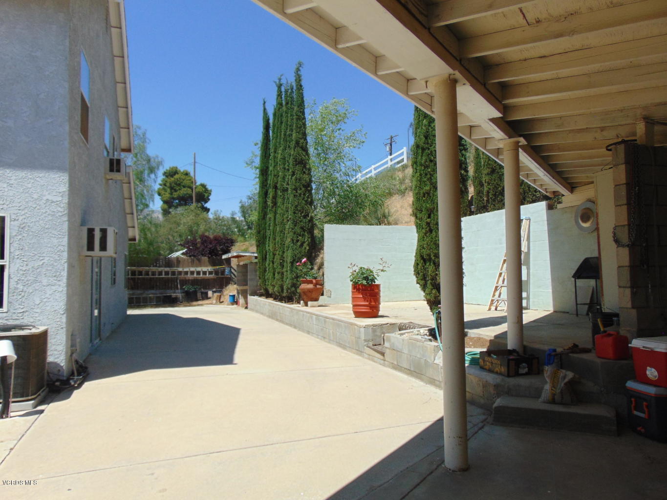 34440 Red Rover Mine Road Acton, CA 93510 - Photo 28 of 39 a view of a porch with couches table and chairs
