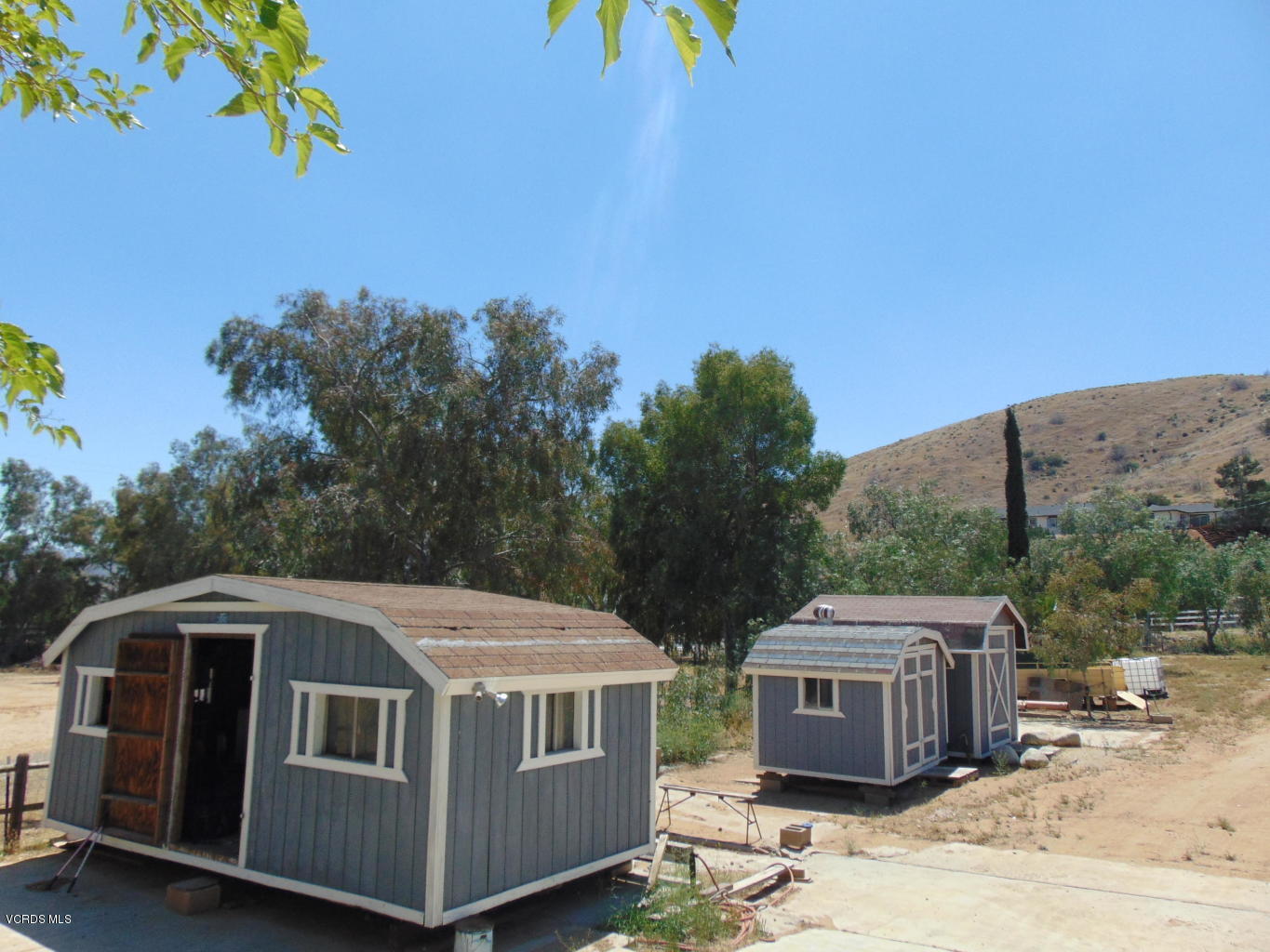 34440 Red Rover Mine Road Acton, CA 93510 - Photo 30 of 39 a front view of a house with a yard