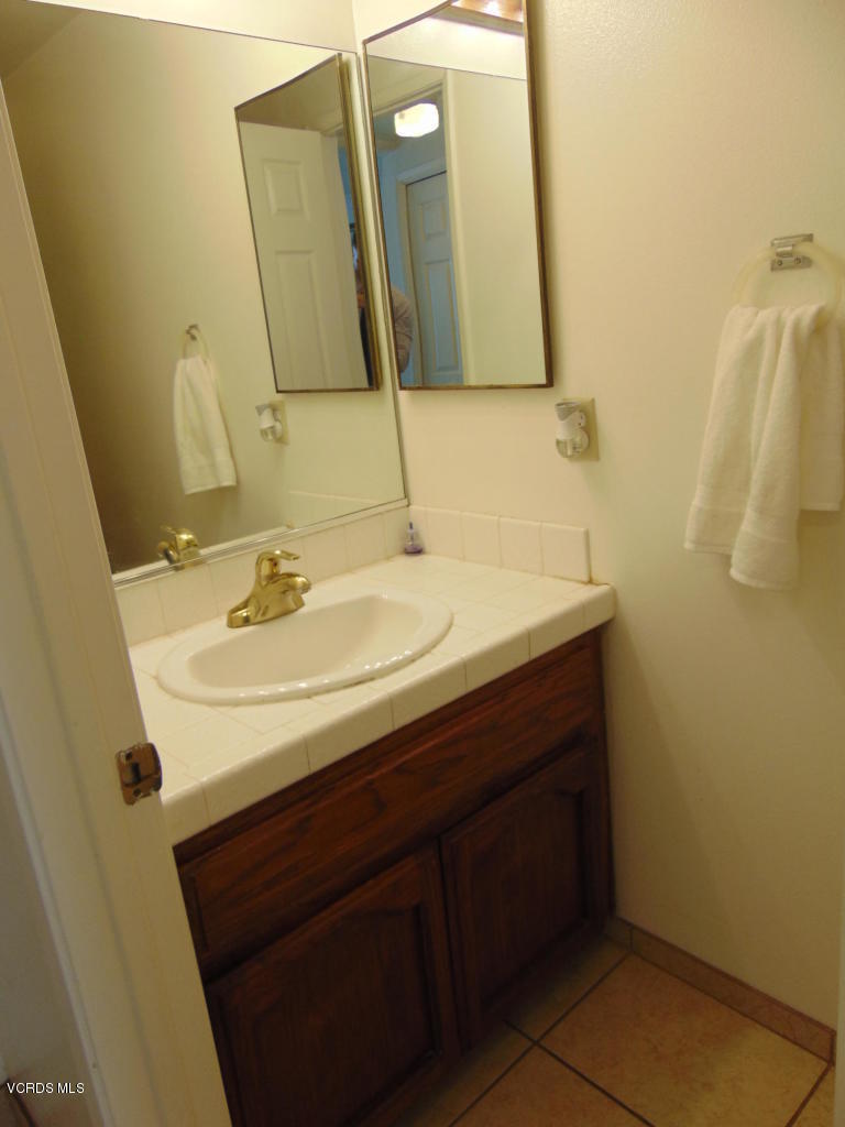 34440 Red Rover Mine Road Acton, CA 93510 - Photo 9 of 39 a bathroom with a sink vanity and a mirror