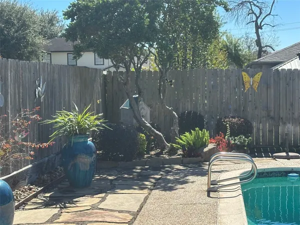 a garden view with a seating space