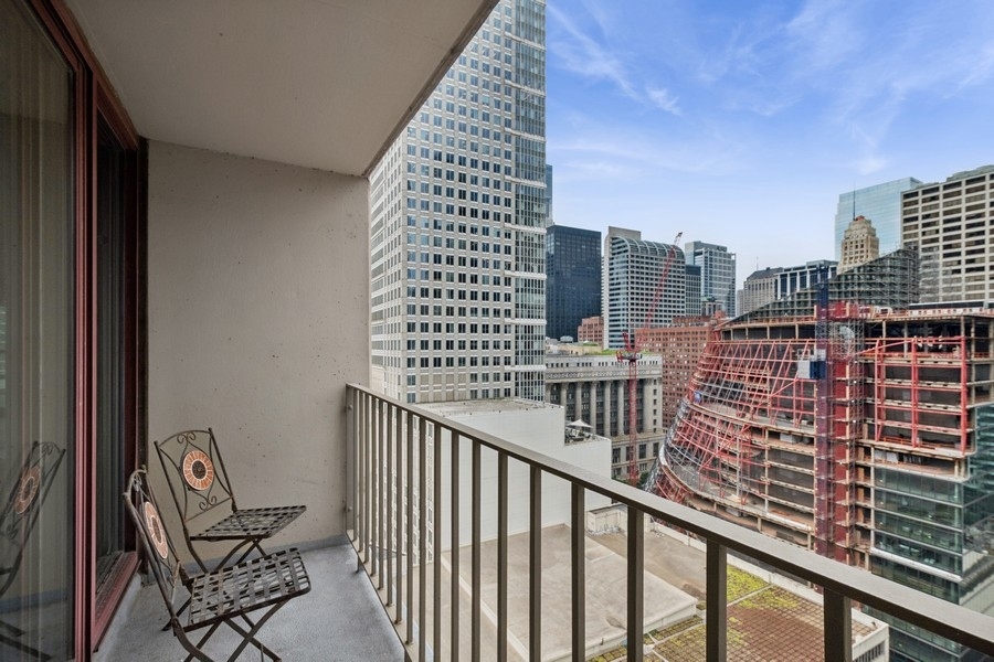 200 North Dearborn Street, Unit 2402 Chicago, IL 60601 - Photo 13 of 22 a view of balcony with a bench