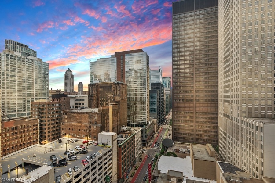 200 North Dearborn Street, Unit 2402 Chicago, IL 60601 - Photo 16 of 22 a view of city with tall buildings