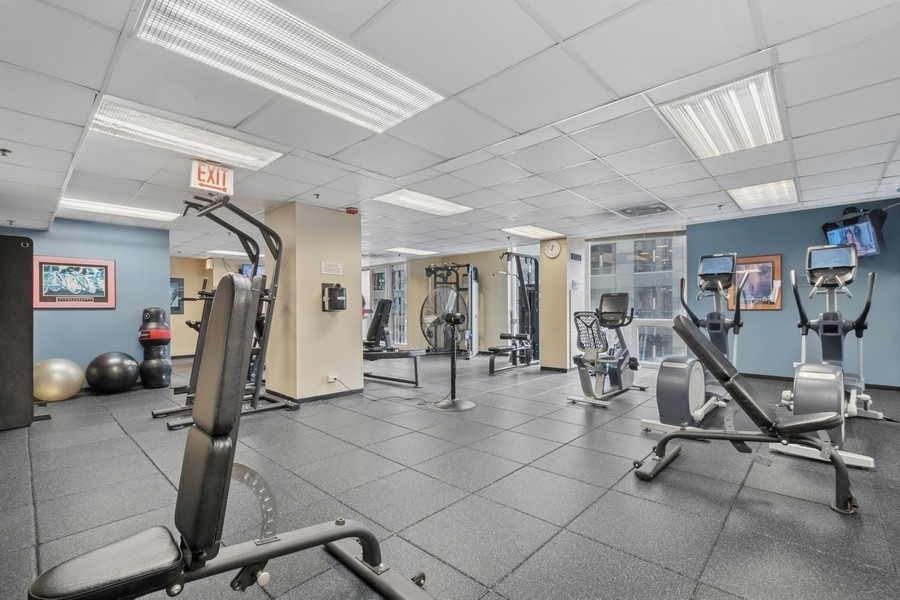 200 North Dearborn Street, Unit 2402 Chicago, IL 60601 - Photo 20 of 22 a view of a room with gym equipment