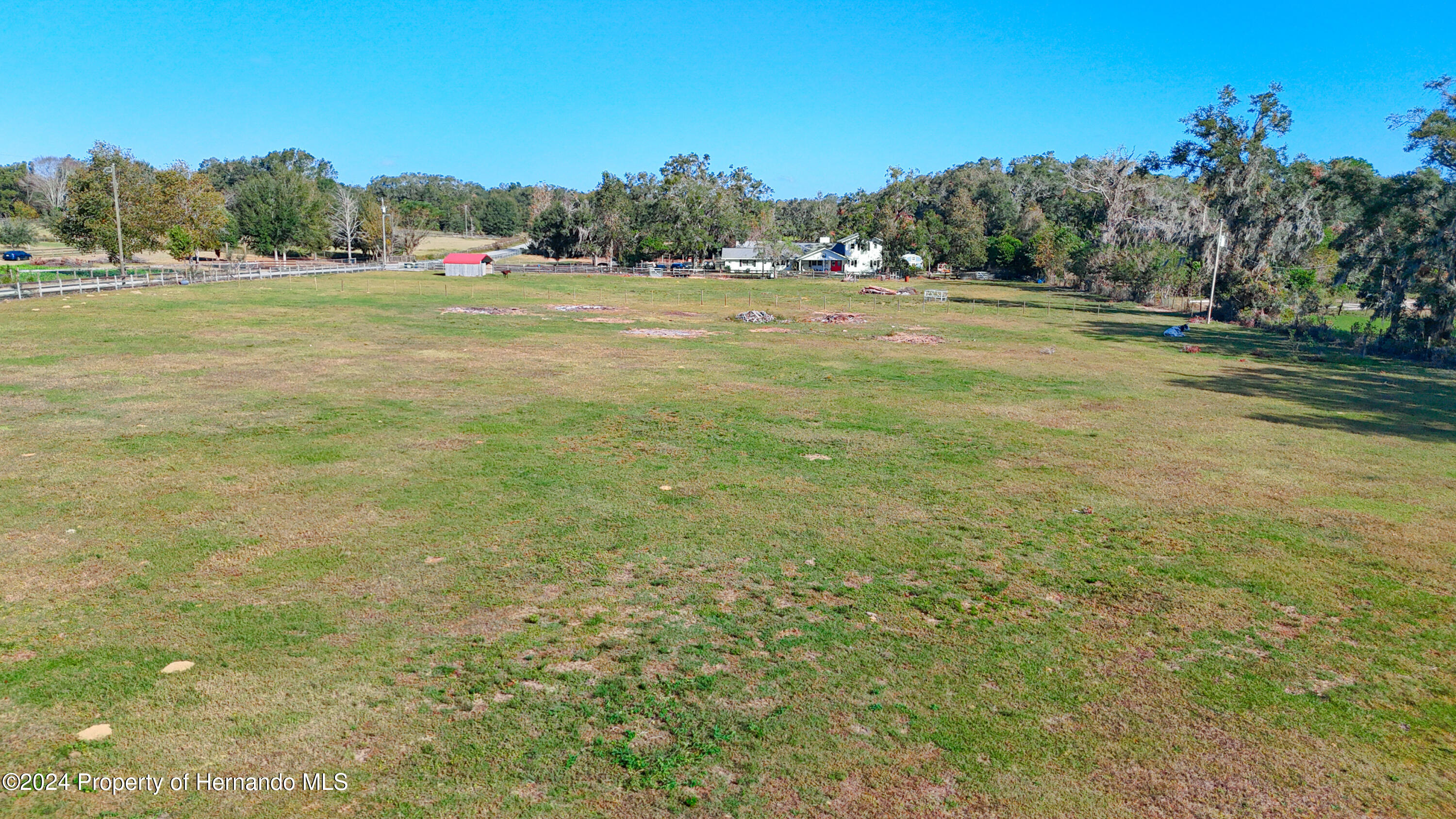 0 Old Trilby Road Brooksville, FL 34602 - Photo 22 of 37 a view of field with trees in the background