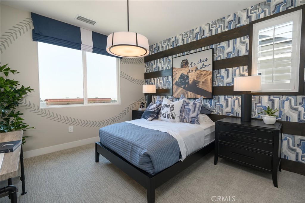 13093 Edgware Drive Rancho Cucamonga, CA 91739 - Photo 11 of 25 a bedroom with a bed and window