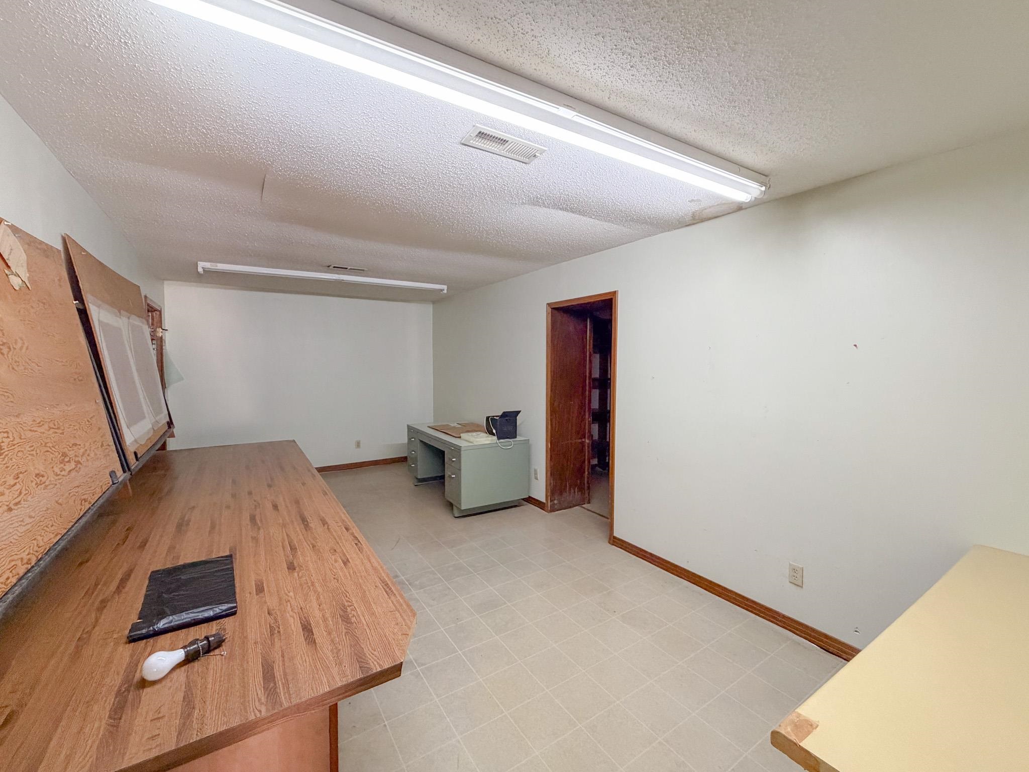 376 2nd Street Belmont, MS 38827 - Photo 18 of 29 a bed room with a bed and a window