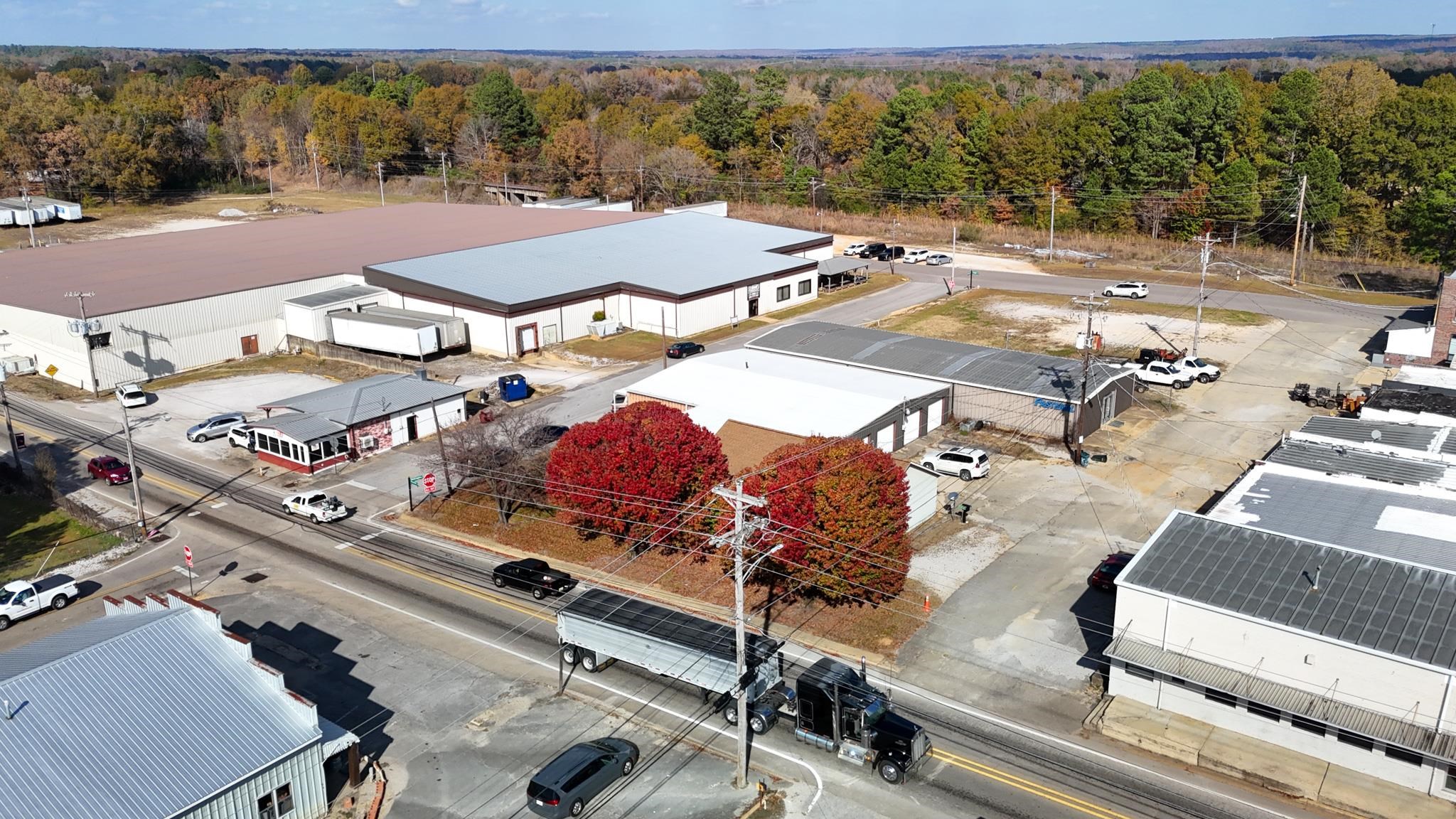 376 2nd Street Belmont, MS 38827 - Photo 18 of 29 an aerial view of a swimming pool with a yard