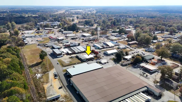 an aerial view of a house with a mountain view