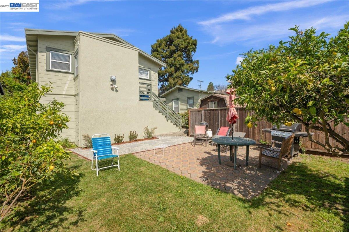 1504 Tenth Street Berkeley, CA 94710 - Photo 10 of 12 a view of a house with backyard and sitting area