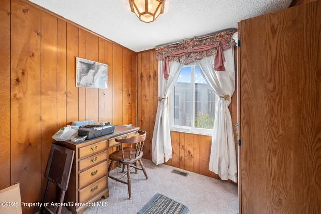 a table and chairs in a room