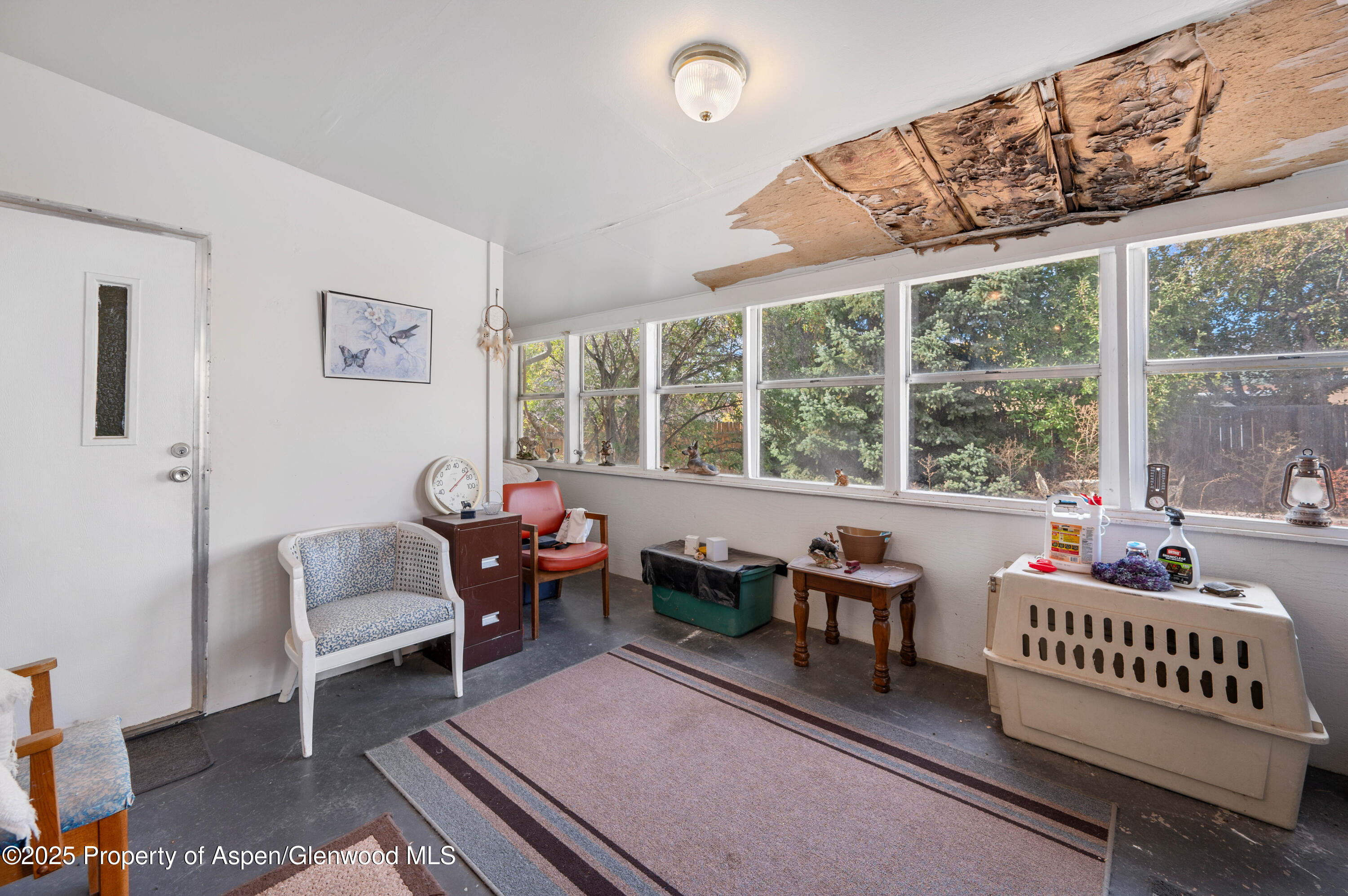 45 West Tamarack Circle Parachute, CO 81635 - Photo 18 of 23 a living room with furniture and a large window