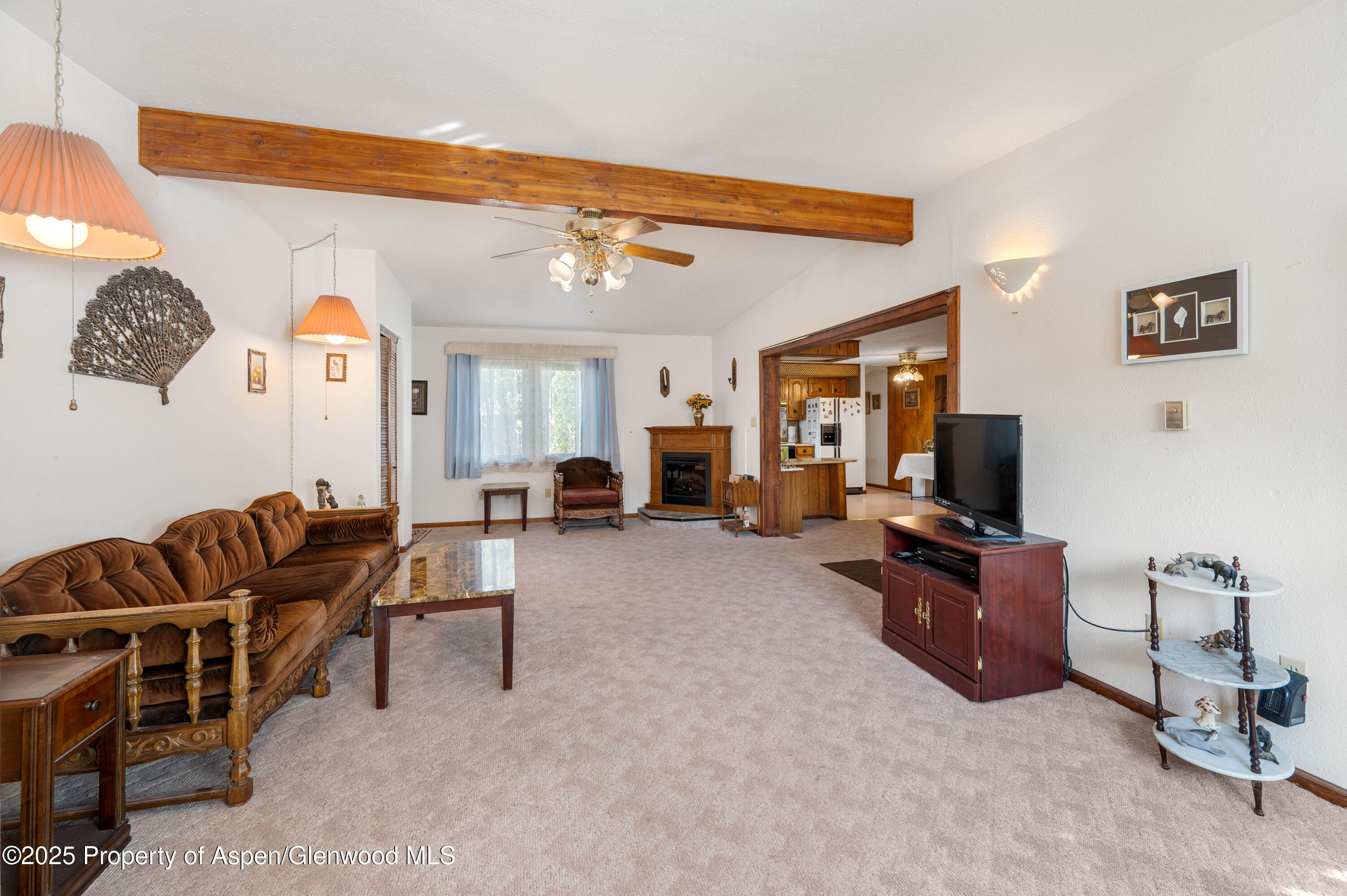 45 West Tamarack Circle Parachute, CO 81635 - Photo 2 of 23 a living room with furniture and a flat screen tv