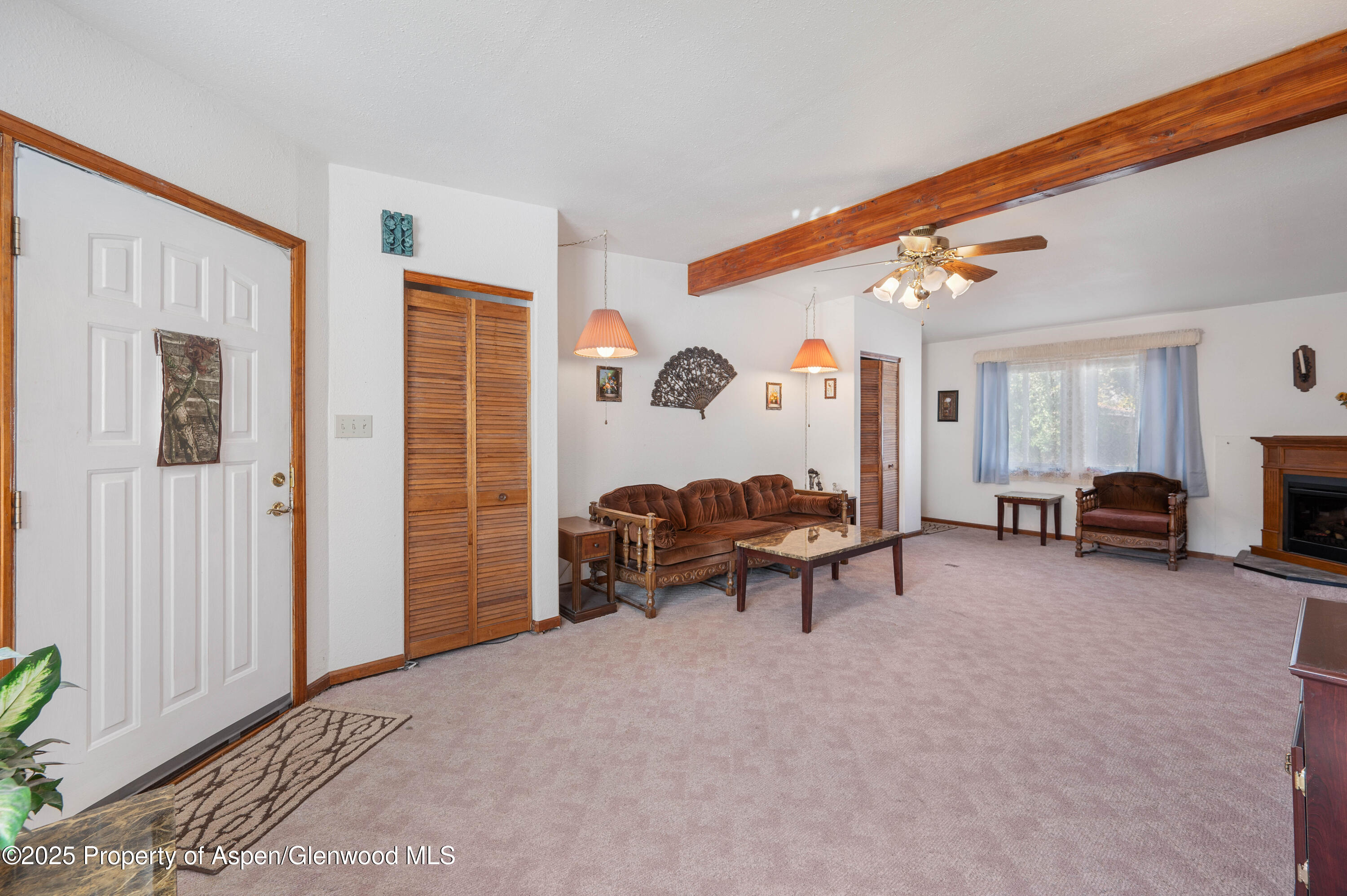 45 West Tamarack Circle Parachute, CO 81635 - Photo 3 of 23 a view of a livingroom with furniture and a window
