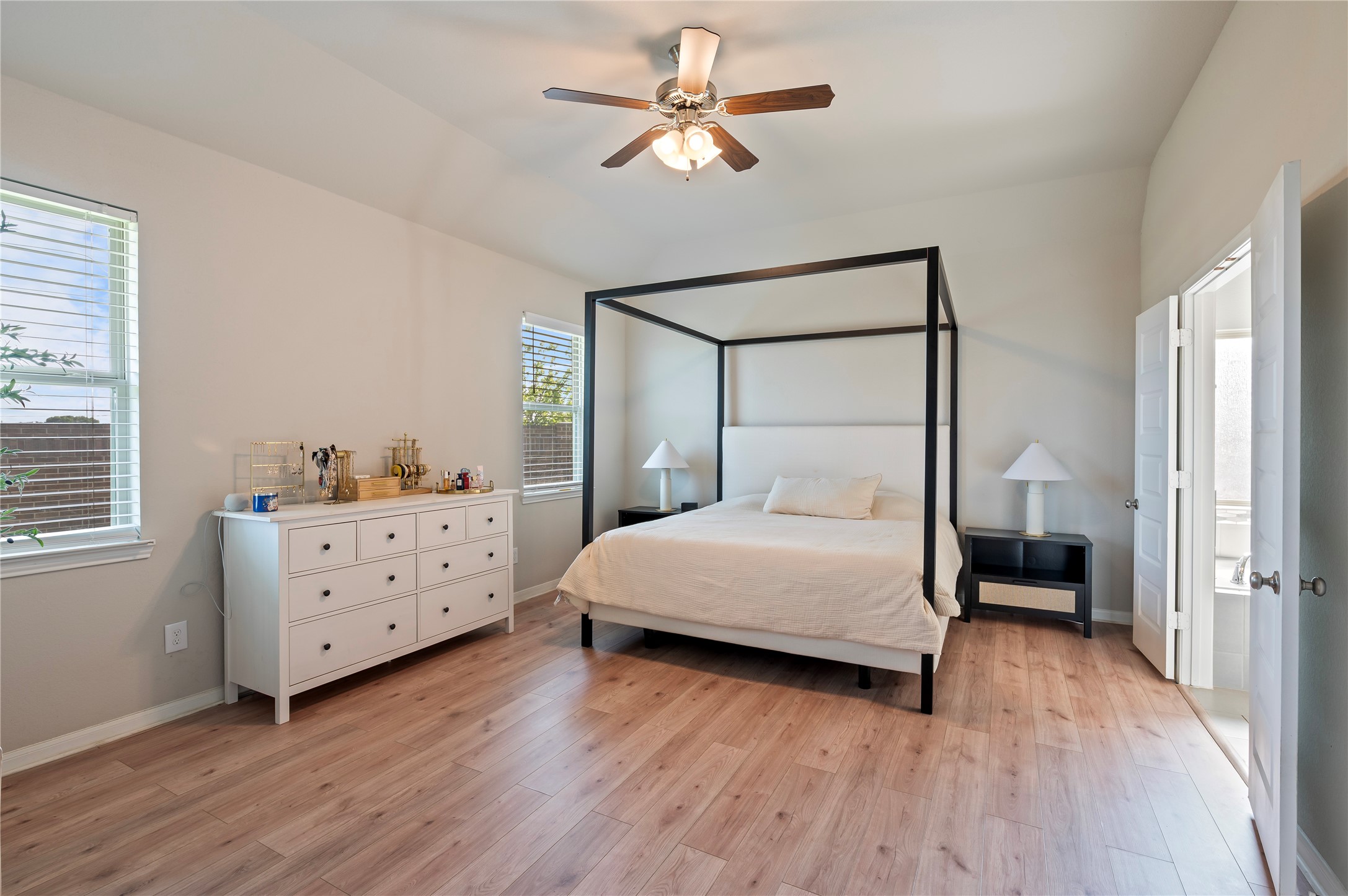 7802 Bellwick Court Pasadena, TX 77505 - Photo 20 of 37 a bedroom with a bed and a dresser