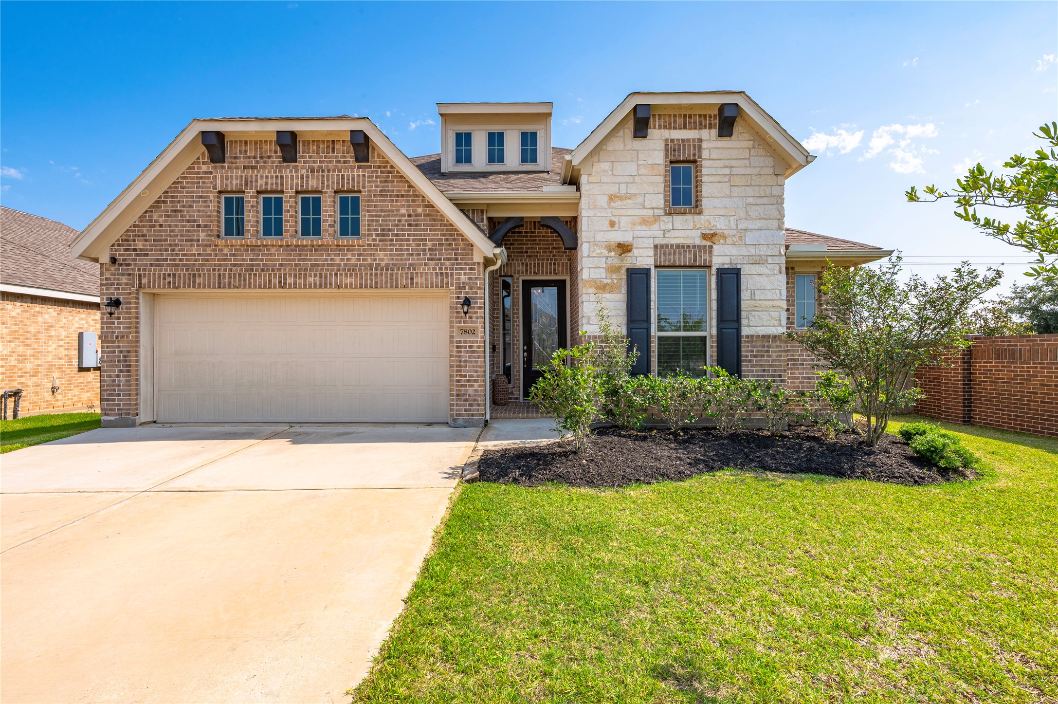 7802 Bellwick Court Pasadena, TX 77505 - Photo 2 of 37 a front view of a house with a yard