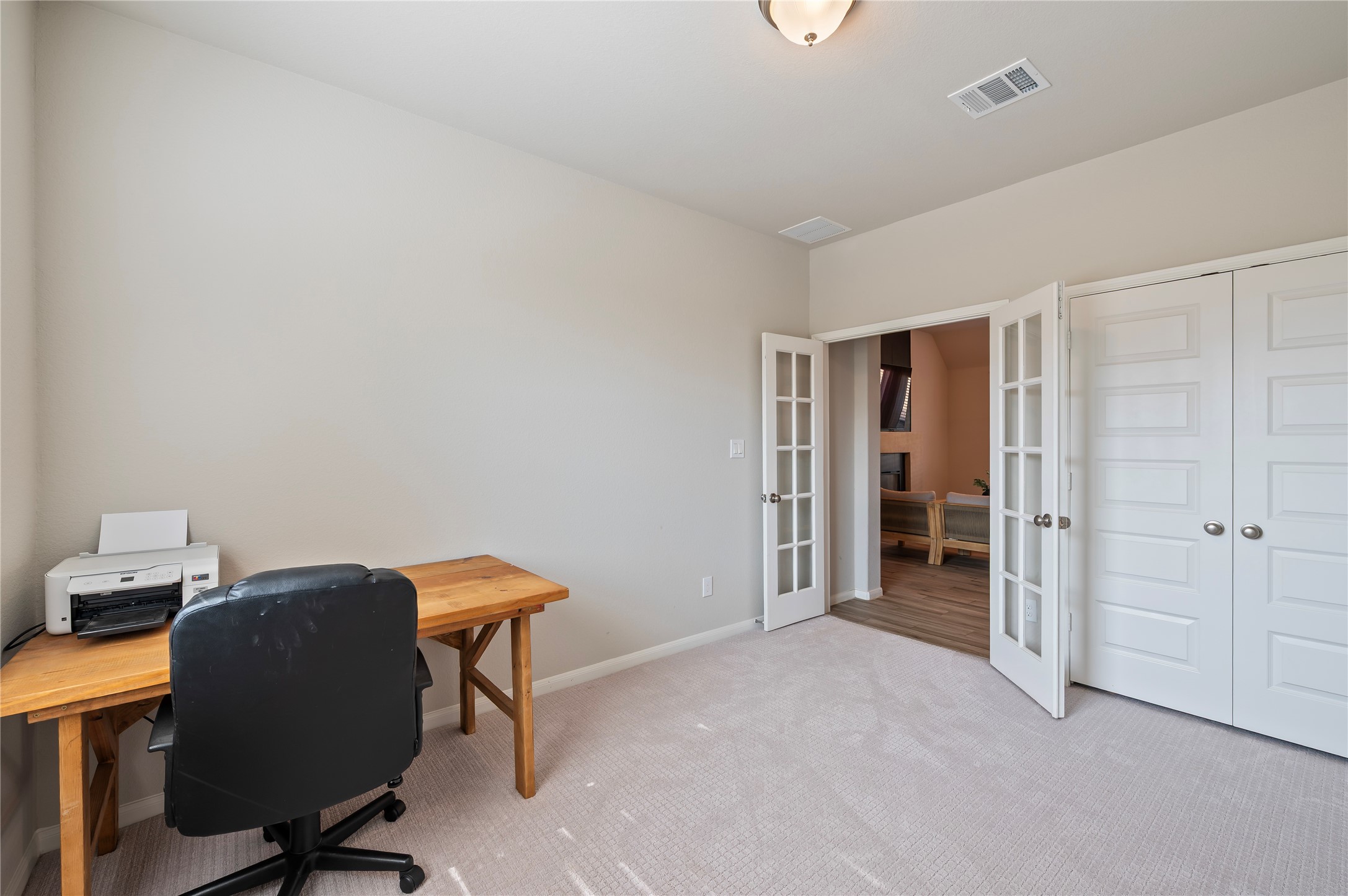 7802 Bellwick Court Pasadena, TX 77505 - Photo 25 of 37 a view of workspace with furniture and closet