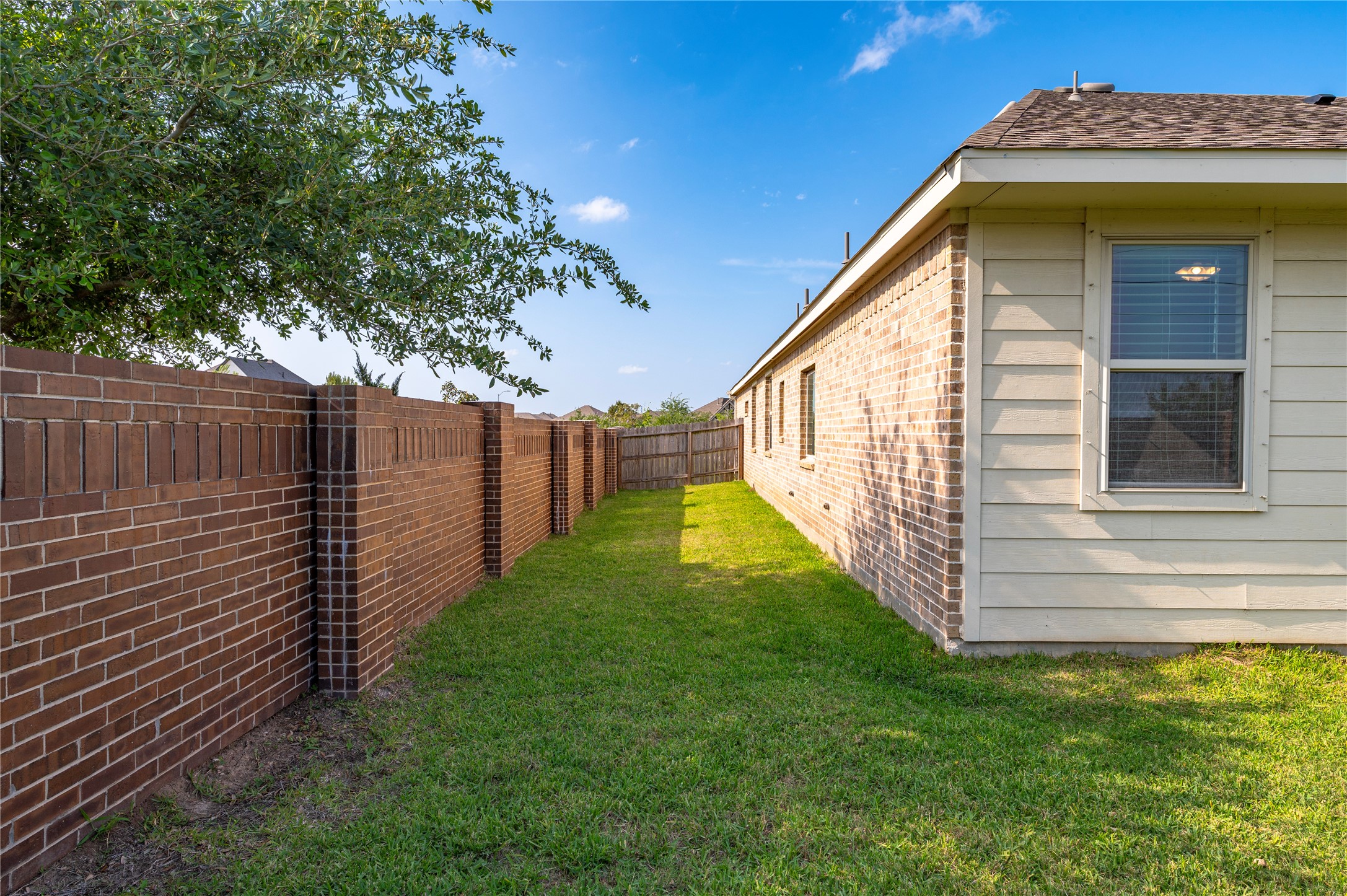 7802 Bellwick Court Pasadena, TX 77505 - Photo 32 of 37 a view of a house with a yard