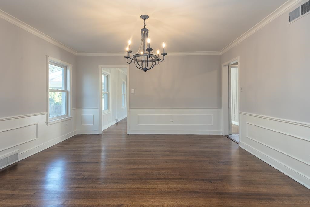 500 Colonial Road Memphis, TN 38117 - Photo 17 of 35 wooden floor in an empty room with a window