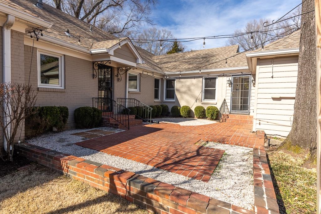 500 Colonial Road Memphis, TN 38117 - Photo 35 of 35 a view of a house with backyard porch and sitting area