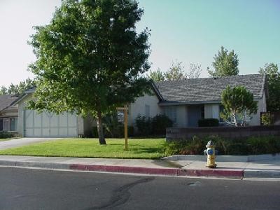 14509 Ponderosa Ranch Road Victorville, CA 92392 - Photo 1 of 1 a house view with a garden
