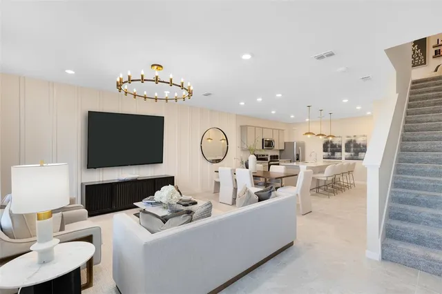 a living room with furniture and decor