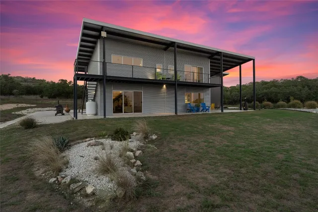 a view of a lush green space with sea