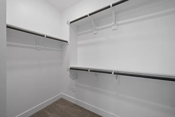 a view of an empty walk in closet