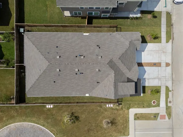 a view of swimming pool with a yard