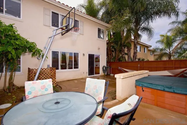 a backyard of a house with seating space
