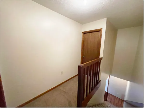 a view of hallway with stairs