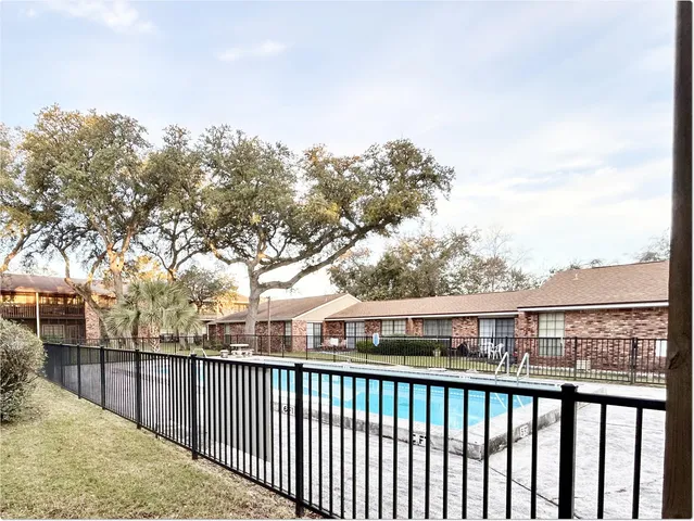 a view of a street from a balcony