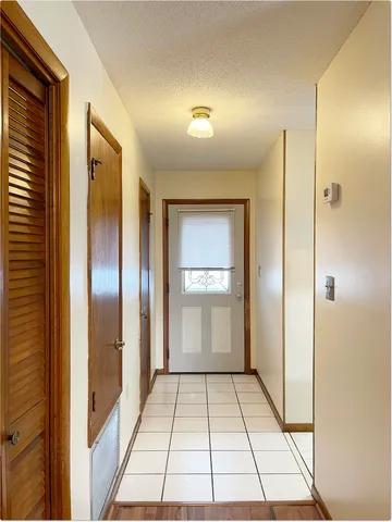 a bathroom with a shower and a mirror
