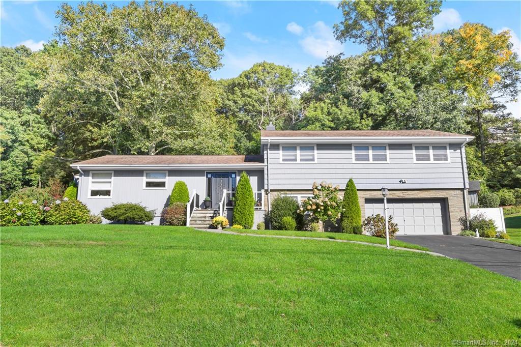 a house view with a garden space