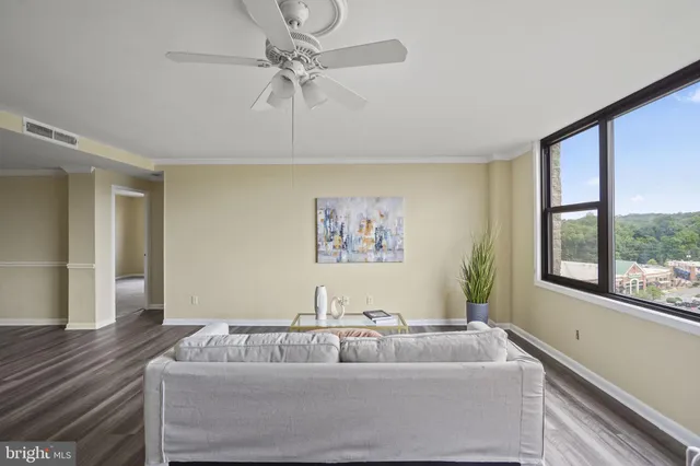 a bathroom with a bathtub and a window